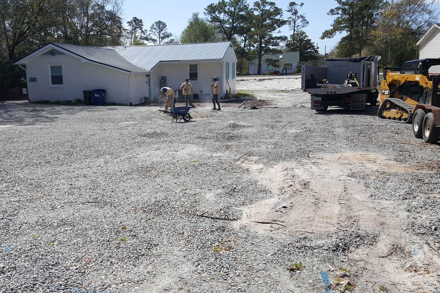 The beginning stages of installing a gravel driveway.